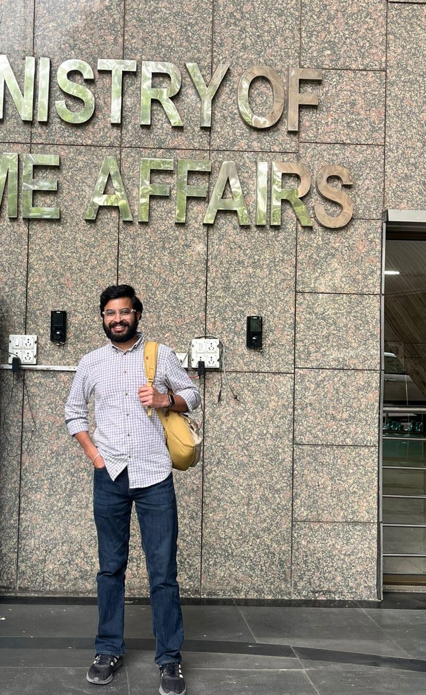 Ritesh standing outside the Ministry of Home Affairs building in New Delhi